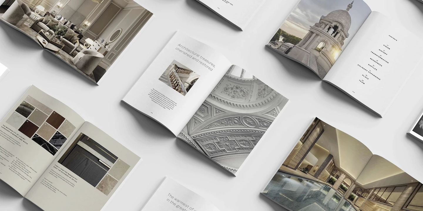 A flat-lay of The OWO brochure spreads showing materials, architecture and contents pages