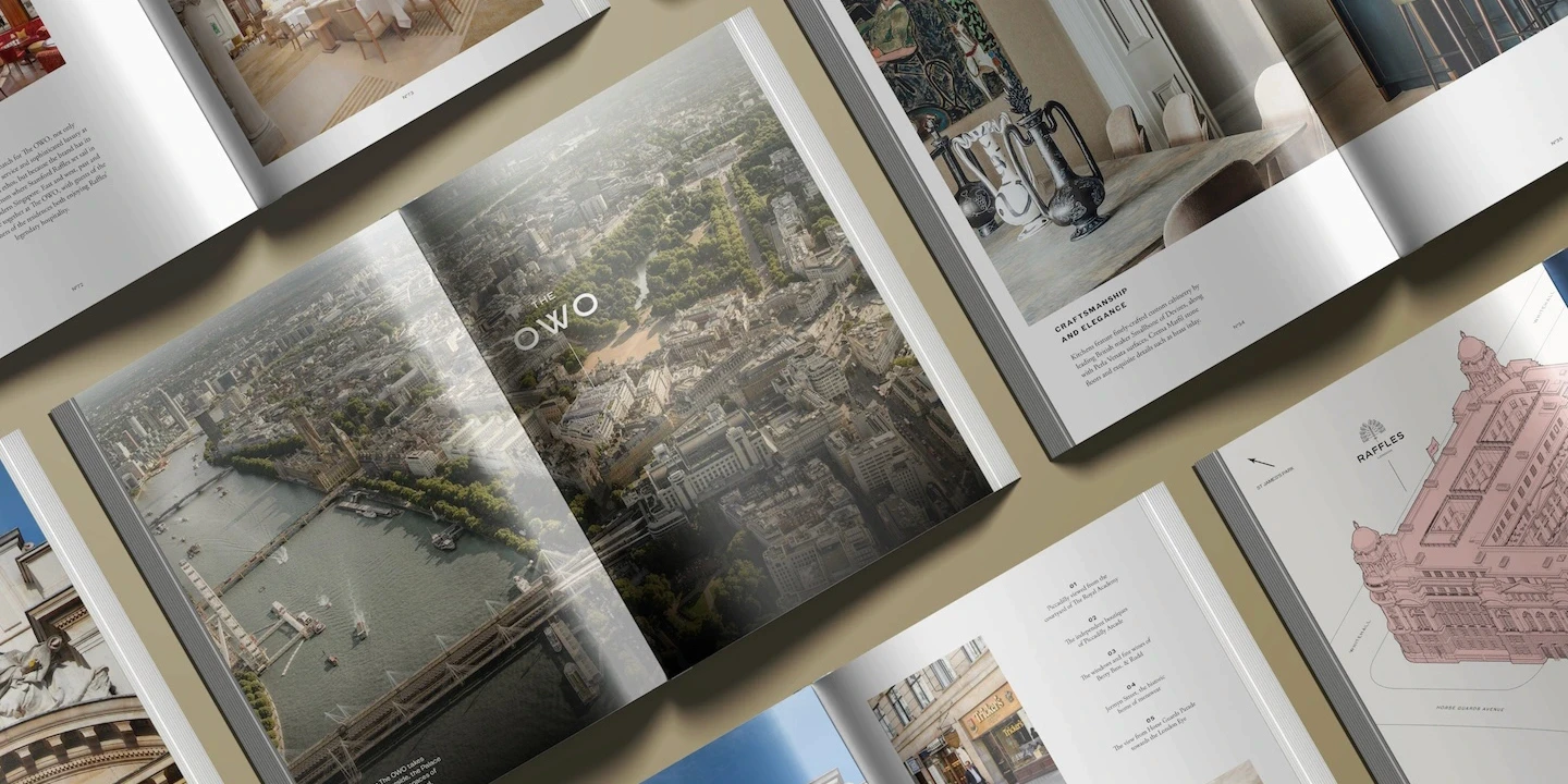 The OWO brand book spreads, including an aerial of London with the OWO wordmark